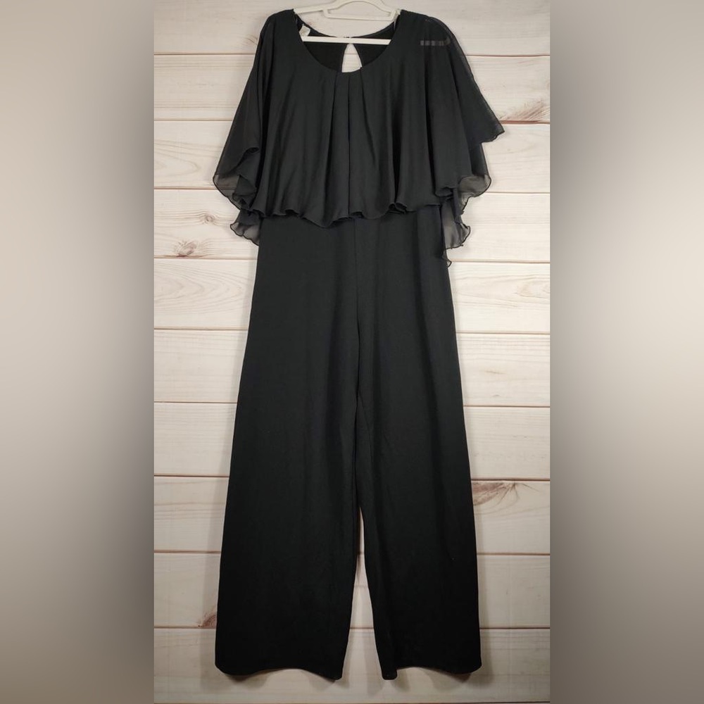Find me plus 2X dressy jumpsuit Woman’s sheer overlay on top sewn in.